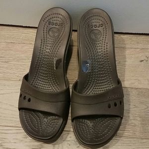 Crocs sandals.